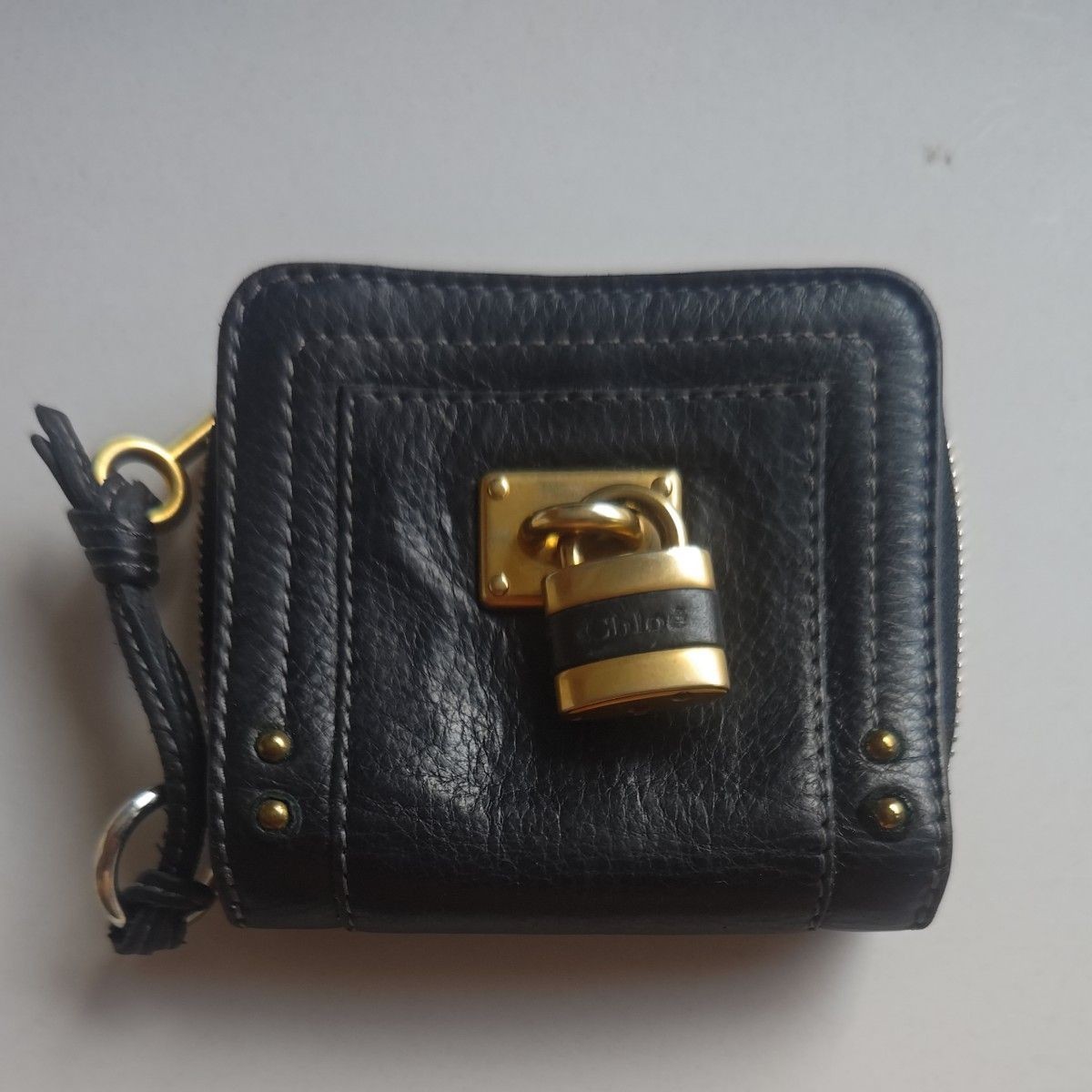 Chloe bifold wallet black gold hardware padlock