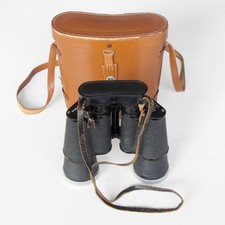 Weltblick - vergütet - Fernglas 10x50 / Sehfeld 85m auf 1000m / mit Lederköcher