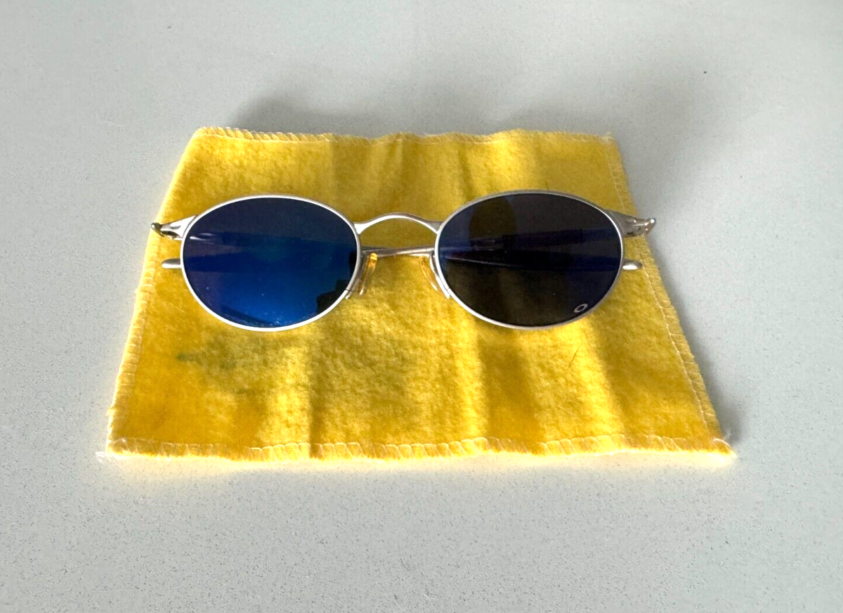 OAKLEY JORDAN OO E WIRE SUNGLASSES Silver Frames BlueLenses OAKLEY JORDAN OO E WIRE SUNGLASSES Silver Frames BlueLenses
