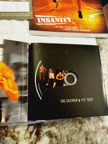 BeachBody - Insanity Workout Program - 10 Disc DVD + 3 = 13 total discs - Picture 6 of 10