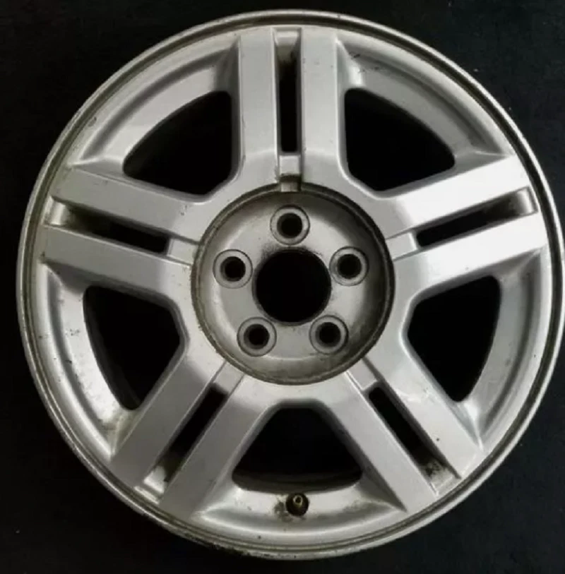 Tapacubos centrales de llantas de aleación Ford Windstar 2001 a 2003 de fábrica Foto 2 de 4