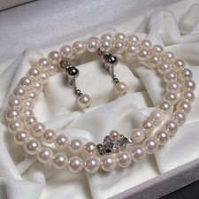 Highluster Akoya pearl necklace and earrings approximately 6570mm with box