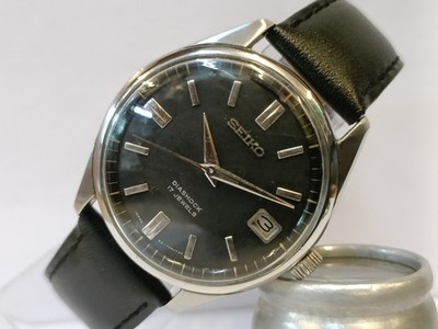 VINTAGE SEIKO DIASHOCK 17J WINDING BLACK DIAL 6602-8990 JAPAN