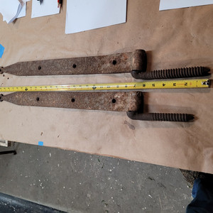 pair of antique large iron starp hinges hand forged 25" long, with pintles