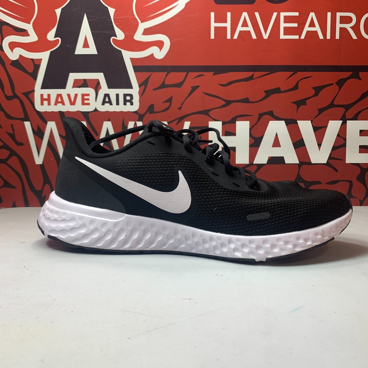 sepatu nike revo 5