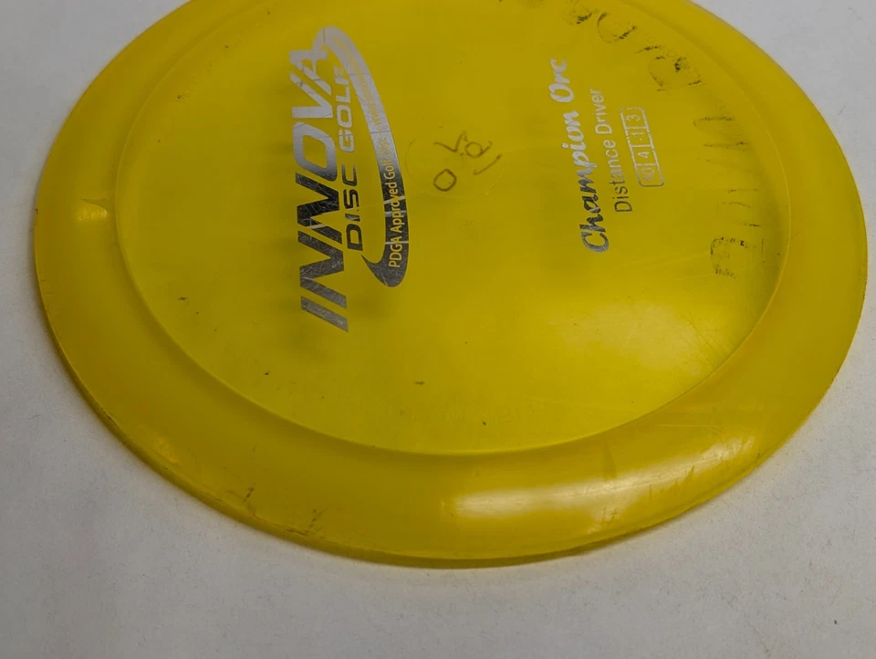 Innova Champion Orc Disc Golf Distance Driver 164g Yellow Old Run Penned - Image 3 of 4