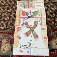 MEDICI CUT OUT ADVENT CALENDAR ENGLAND STAND UP Snowman cozy hearth scene