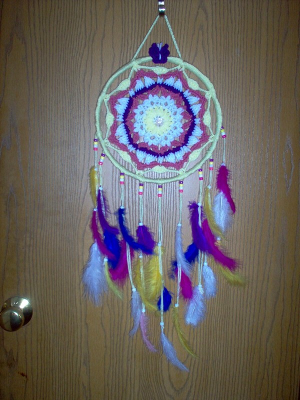 Hand crafted crochet dream catcher, yellow, purple, white. 13" x 26"