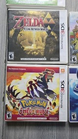 Nintendo 3DS XL Blue SPR-001 (USA) w/ 6 Games
