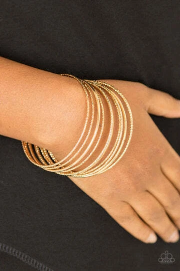 Bangle babe deals gold paparazzi