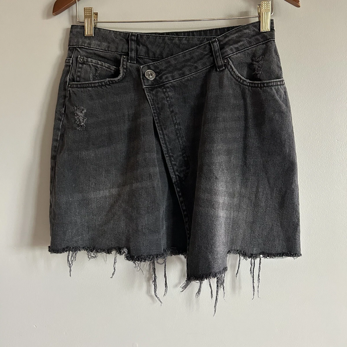 Crossover asymmetric distressed denim shorts