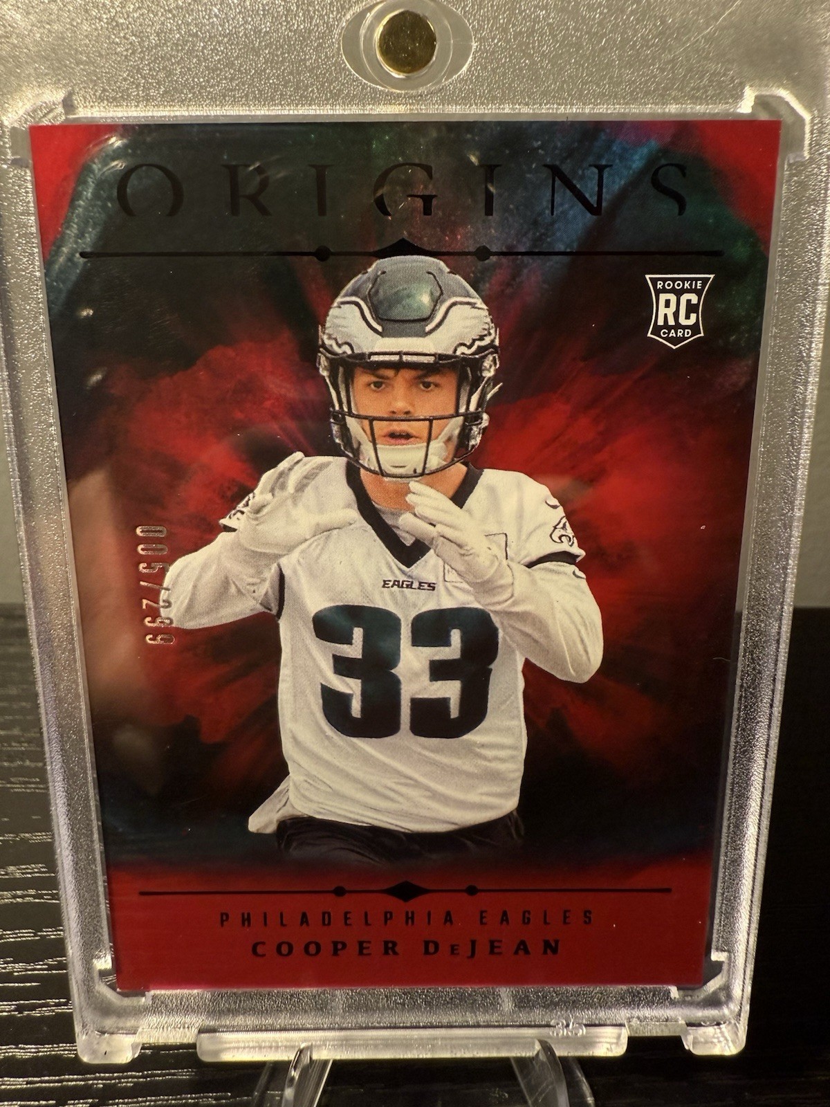 2024 Panini Origins - Rookies Cooper DeJean #127 Holo Red /299 (RC)