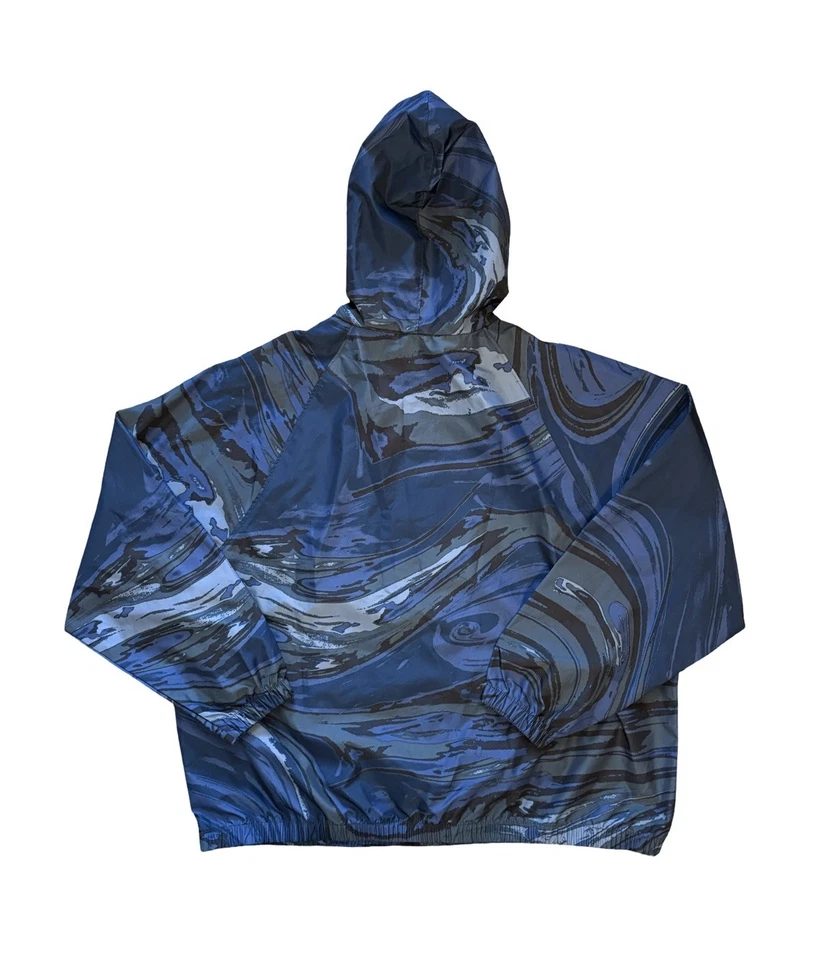 Chaqueta cortavientos New Balance azul para correr con capucha para lluvia para mujer talla grande Foto 2 de 4