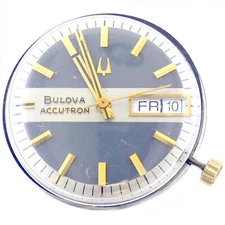 BULOVA ACCUTRON 1198 ONE JEWEL GREY SILVER + GOLD ACCENTS CROWN DIAL + MOVEMENT