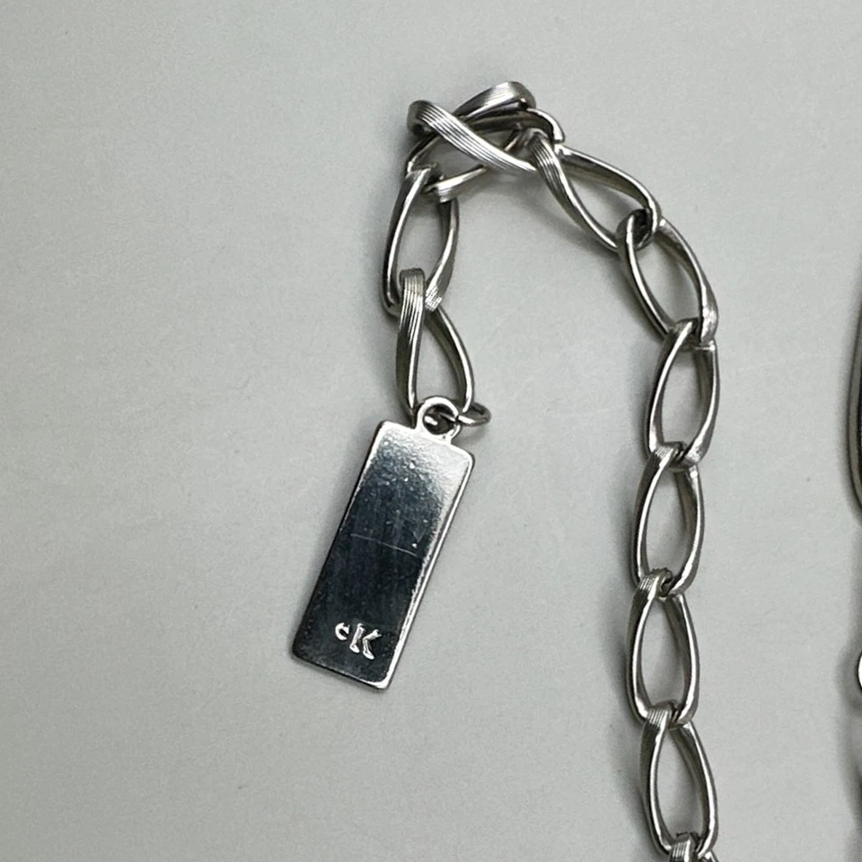 复古 Calvin Klein 椭圆形图案银色几何链腰带 均码 — 第 4/4 张图片