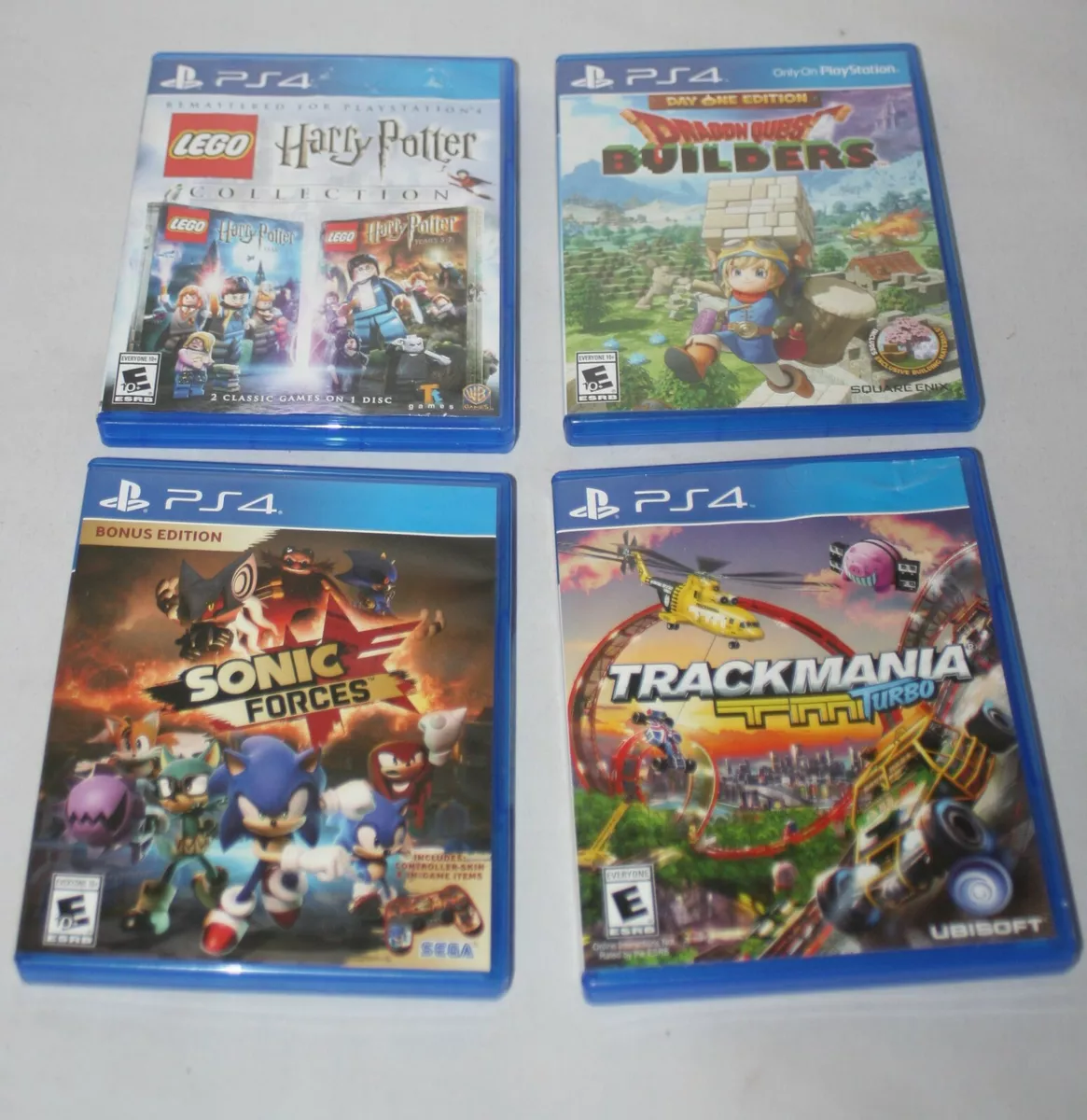 PS4 Lot of 4 Games E Trackmania Turbo, Lego Harry Potter, Sonic