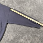 Gray Calvin Klein jeans sweatshirt with long sleeves, yellow measuring tape along the left sleeve.