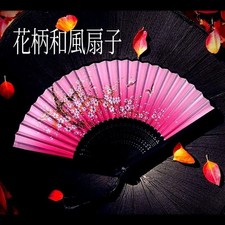 Elegant Japanese-style bamboo fan with a pink gradation and cherry blossom.