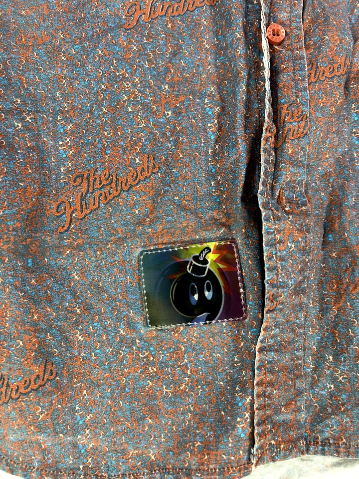 CAMISA DE ALGODÓN CON INSIGNIA HOLOGRAMA ADAM BOMB MEDIANA PARA HOMBRE LOS CIENTOS Foto 2 de 4