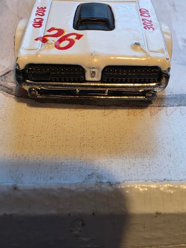 White 1968 Mercury Cougar diecast car with red number 26 decals on hood and sides, 1:64 scale model.