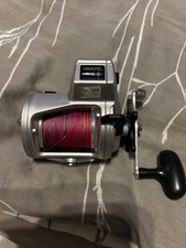 Daiwa Multirolle mit line counter und neuer geflochtener Schnur