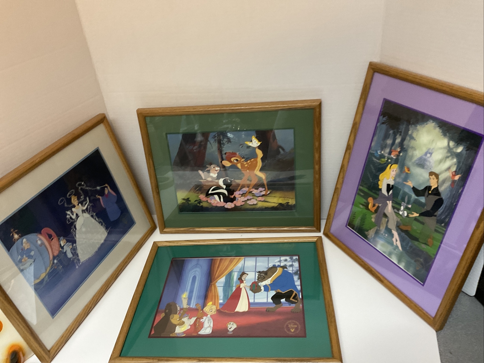 GROUP OF 4 EXCLUSIVE COMMEMORATIVE DISNEY STORE LITHOGRAPHS ALL FRAMED