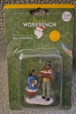 Santa’s Workbench Christmas Village Accessory Man With Bible & Girl NEW NIB
