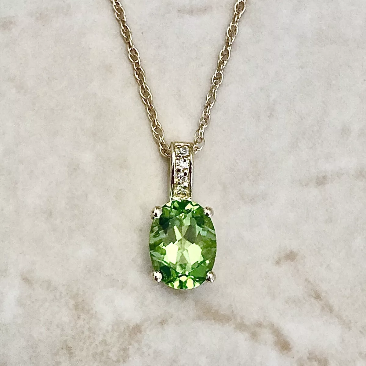 Peridot gold best sale pendant