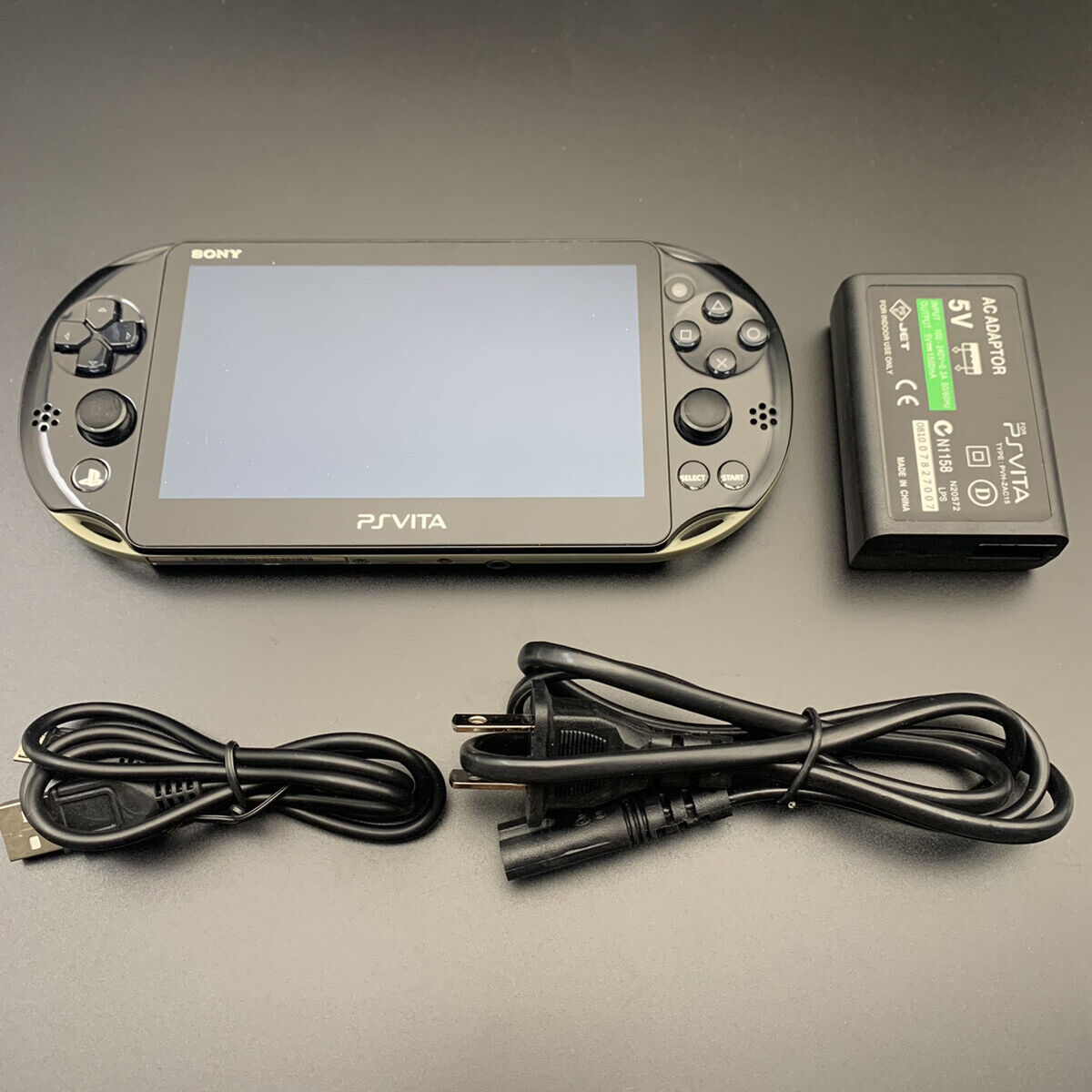 PS Vita PCH-2000 Consola Sony Playstation solamente Cargador elegido  usado