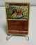 Fletchinder 028/195 Swsh12 holo card with orange-black bird artwork, gold border, and visible attack text.