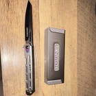 WarTech Silver/Black Metal Handle Plain Blade Manual Pocketknife — photo 1