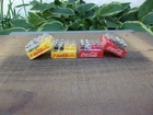 16 Vintage Toy Coca-Cola Cases Miniature Bottles With Yellow and Red Crates.