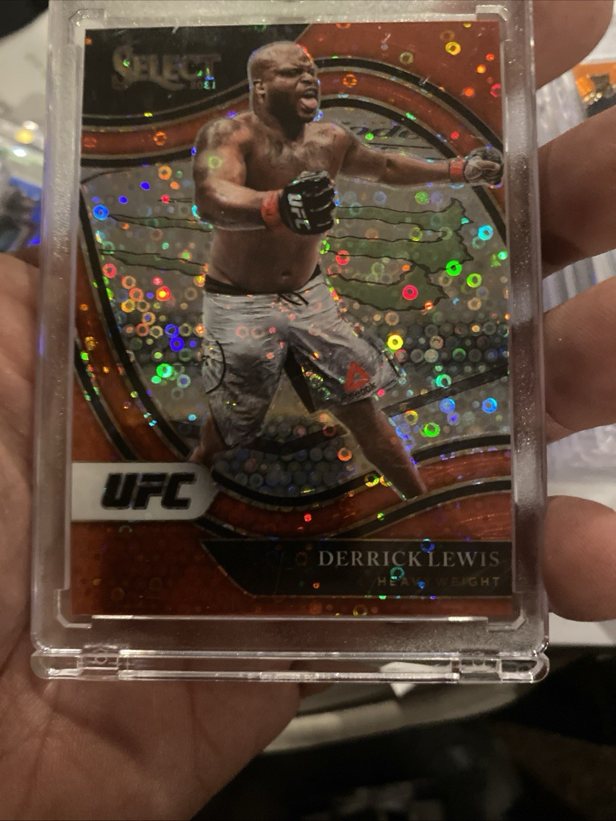 2021 Panini Select UFC - Octagonside Derrick Lewis #269 Red Disco Prizm /199