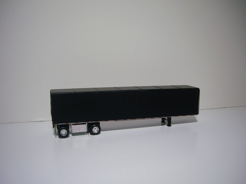 DCP FIRST GEAR 1/64 TEAL PETE 579 WITH SLEEPER AND SIMULATED ROLL TARP TRAILER - Picture 10 of 12