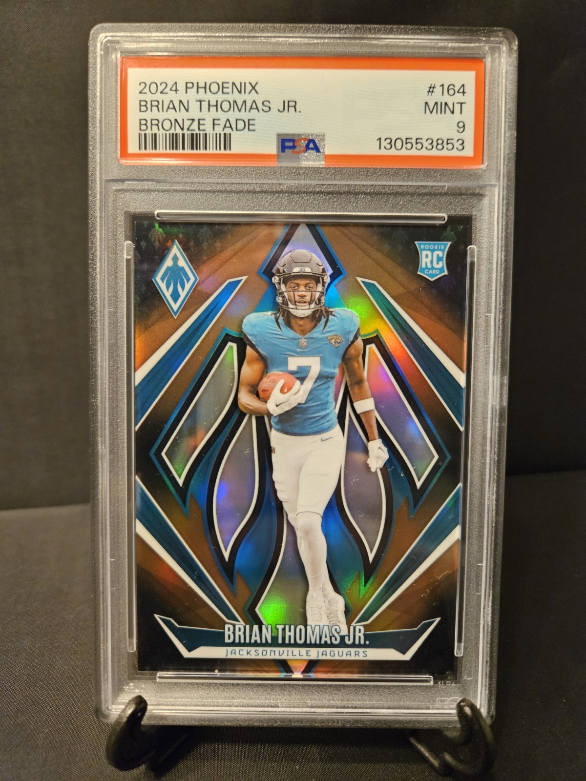 2024 Panini Phoenix - Rookies Brian Thomas Jr. #164 Bronze Fade /125 (RC)