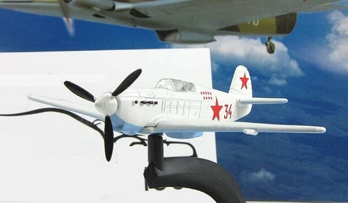 Soviet airplane Yak-1 in winter camouflage №79 series "Legendary aircraft"