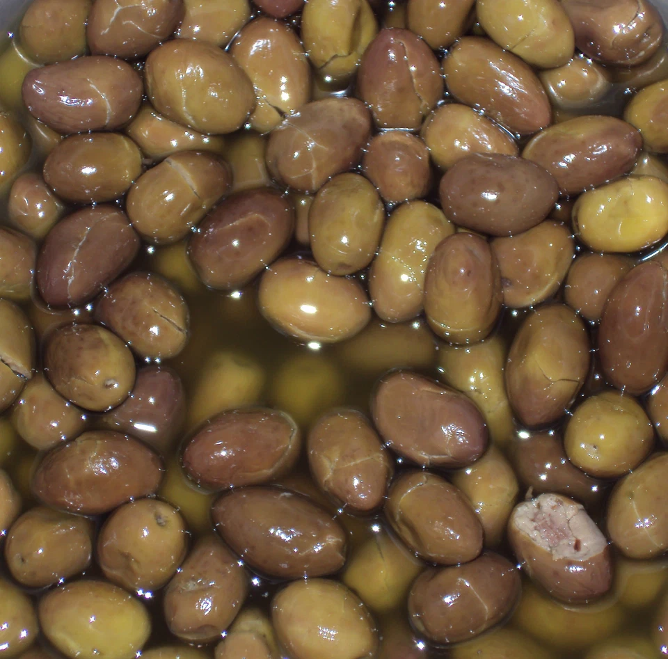 GIURBA olive verdi schiacciate con nocciolo AGLIO ORIGANO( Sicilia che gusto) 750 g