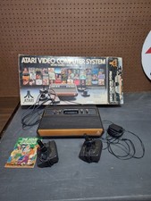 Atari 2600 Video Game Console With 2 Controllers, Catalog & Damaged Box