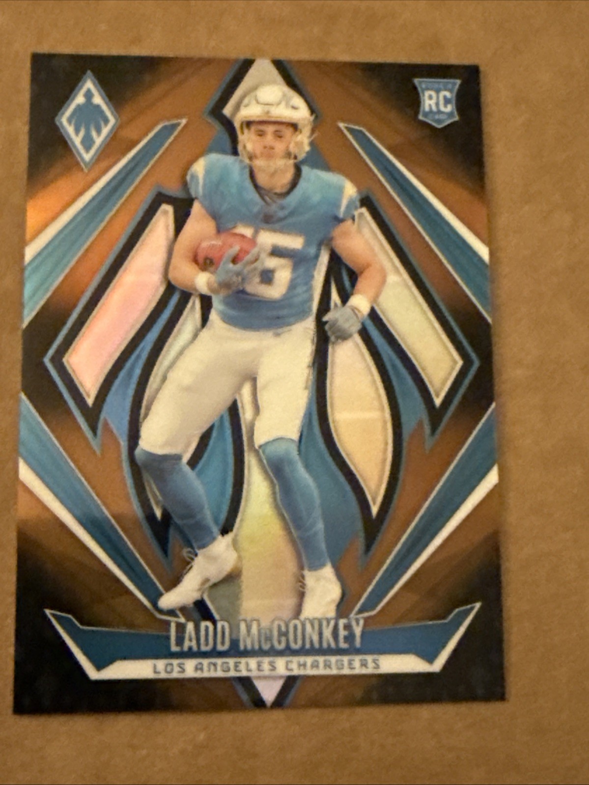 2024 Panini Phoenix - Rookies Ladd McConkey #216 Gold Fade /125 (RC)