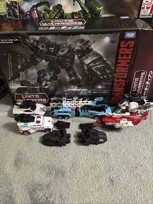Takara Tomy UW-03 Transformers Unite Warriors Defensor With PE Upgrades