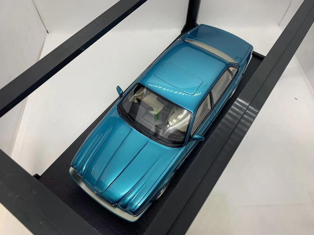 CULT Scale Models 1/18 Jaguar XJR X300 turquoise 1995 with