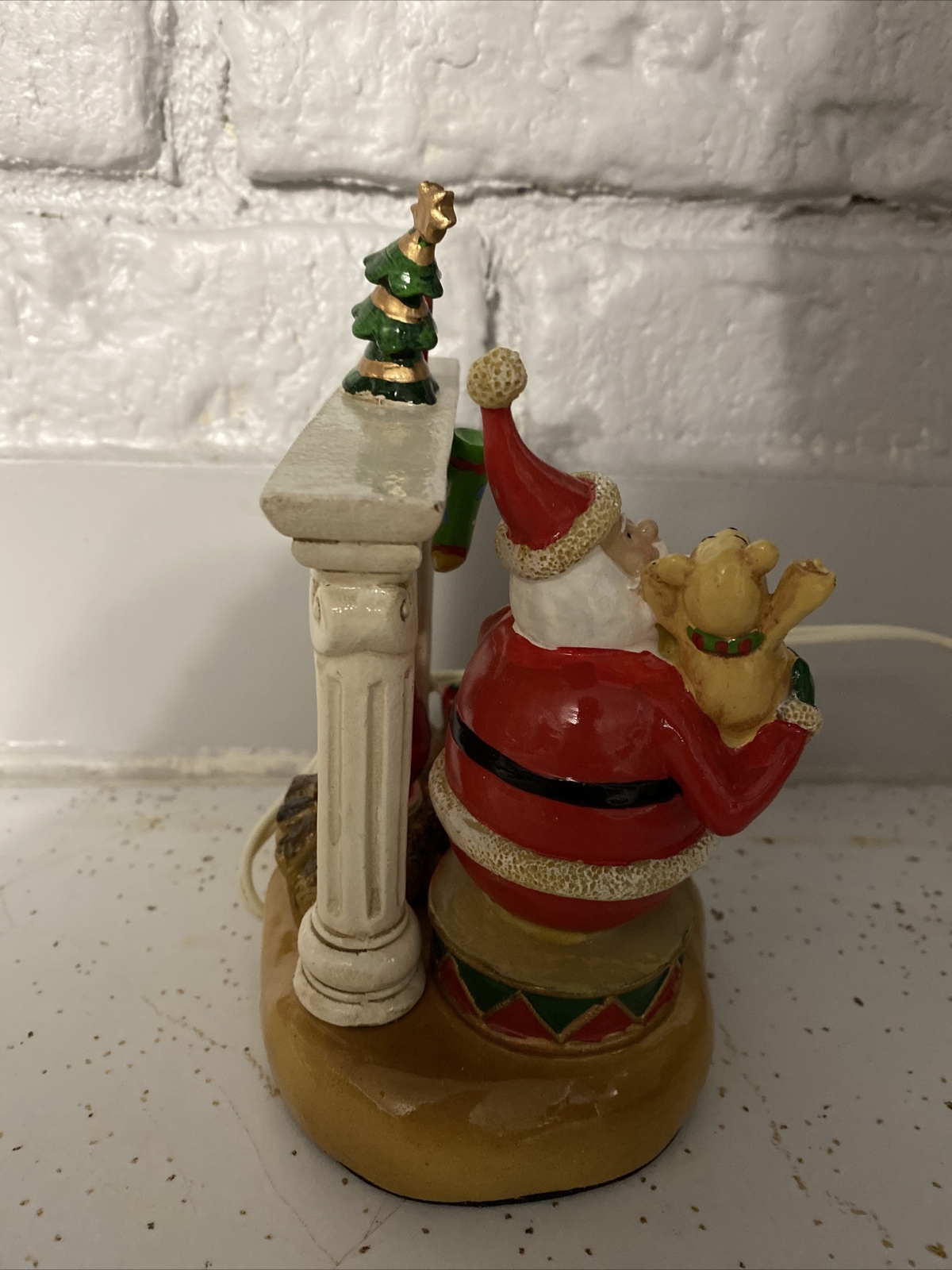 Kirklands home Santa by chimney with teddy bear and presents Flicker