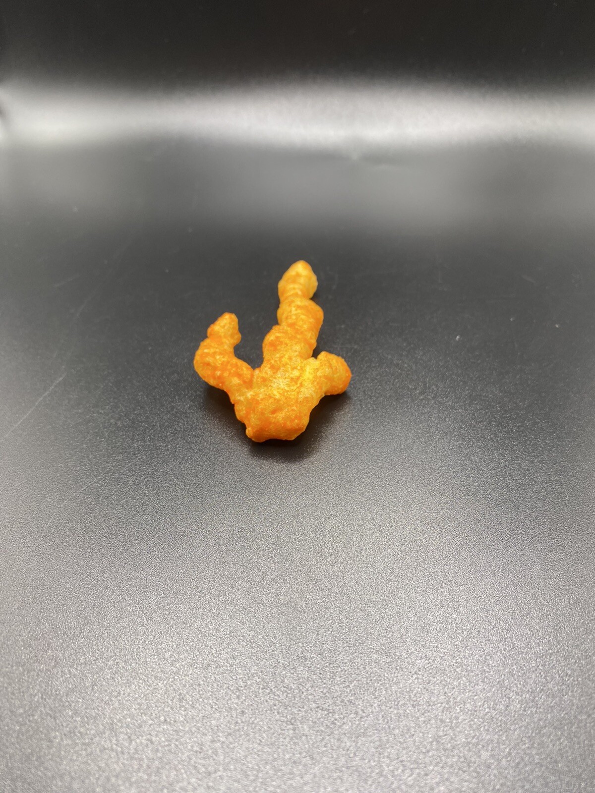 Crunchy Cheeto shaped like a ship’s Anchor or Arrow. | eBay
