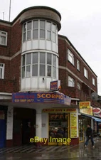 Photo 6x4 Scorpio Minicab and Station Cafe Wood Green Located in a parade c2012