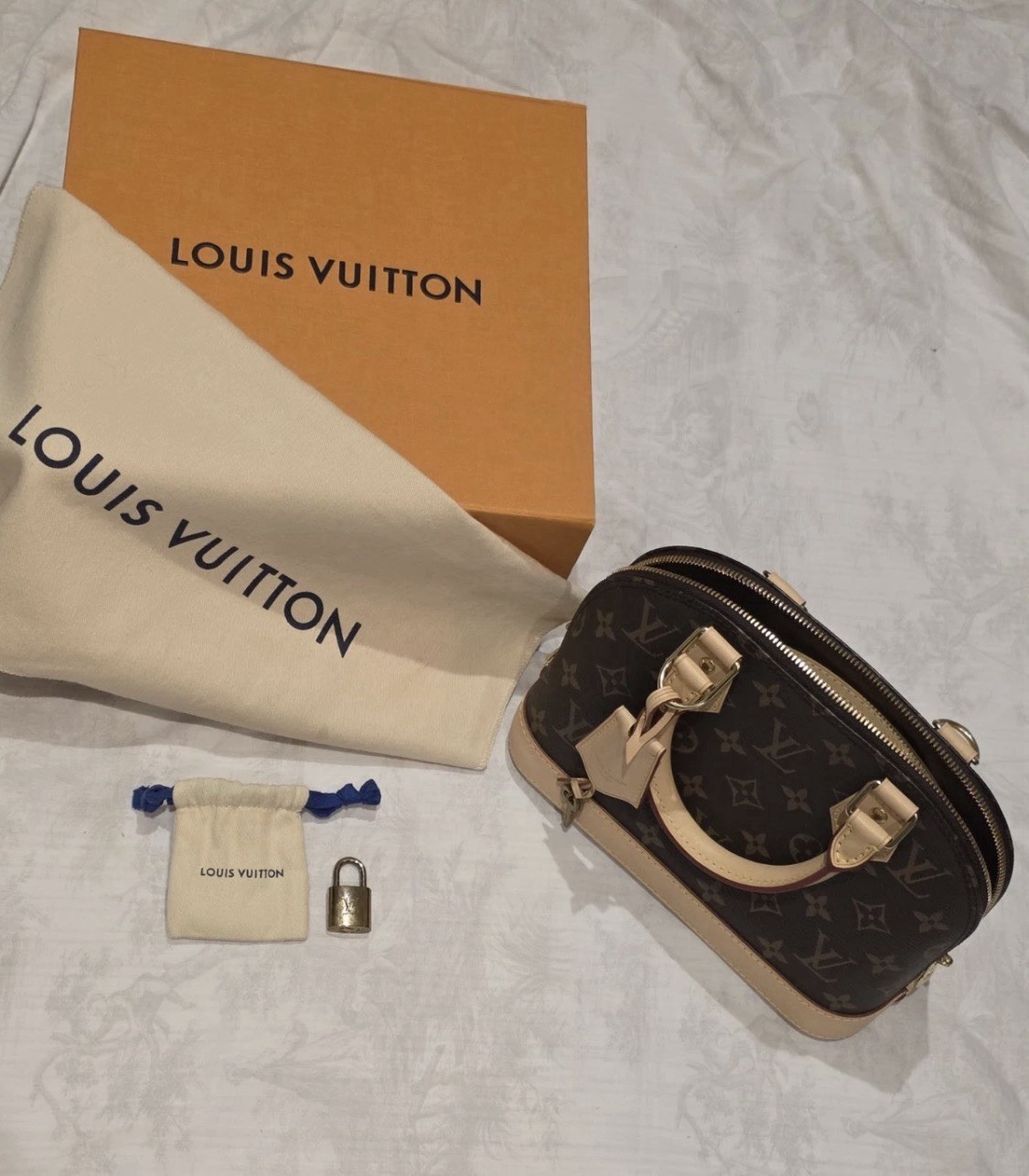 Louis Vuitton Alma Bag