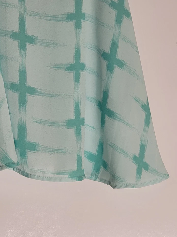 Camisa Soprano Niñas XS Turquesa Sin Mangas Detallada Espalda 100% Poliéster Foto 3 de 4