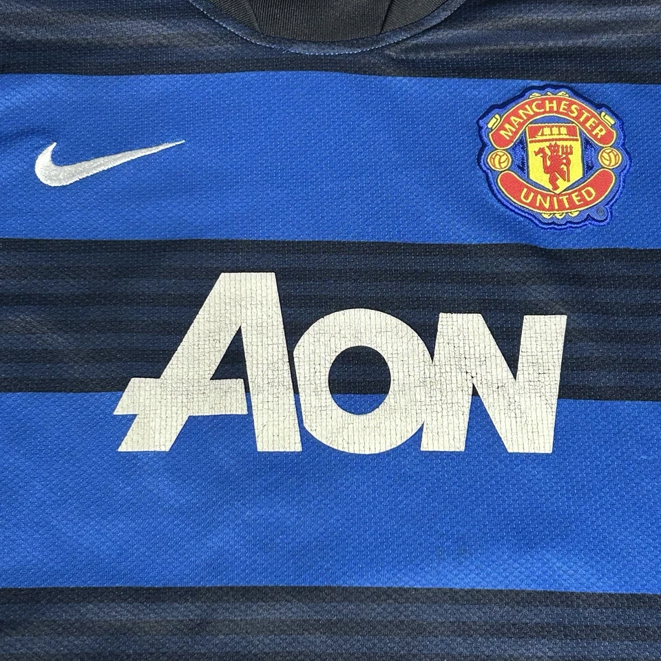 Camiseta deportiva 2011/12 Manchester United azul visitante #10 Wayne Rooney Nike juvenil talla 16 Foto 2 de 4