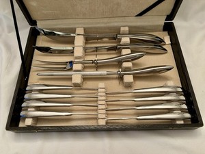 Vintage Japanese stainless steel carving set and eight steak knives.