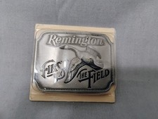 New 1980's Remington First in the Field Pewter Belt Buckle Old Stock