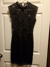 Juniors Black Lace Dress size small. chest and midriff is see through
